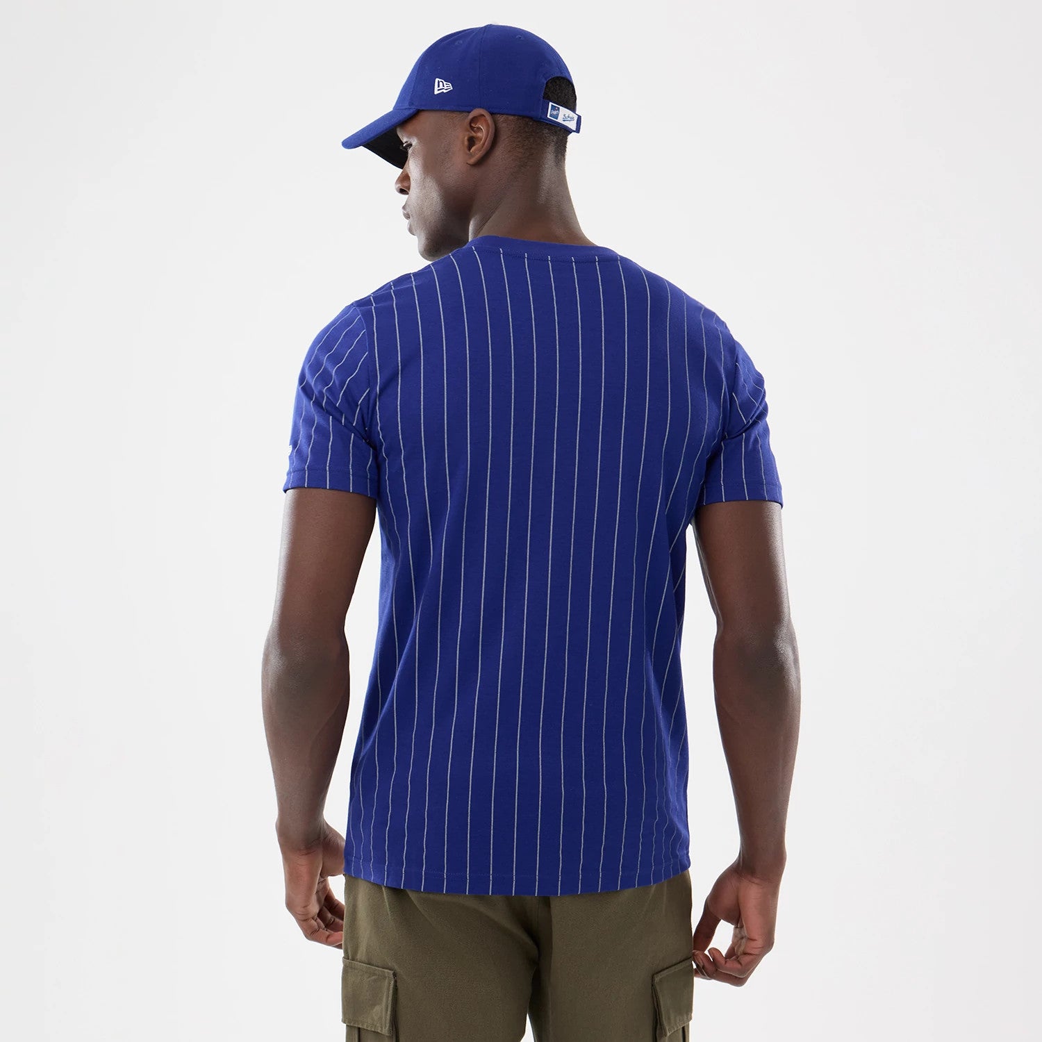 The model is wearing this MLB Pinstripe LA Dodgers T-Shirt in dark blue. 2