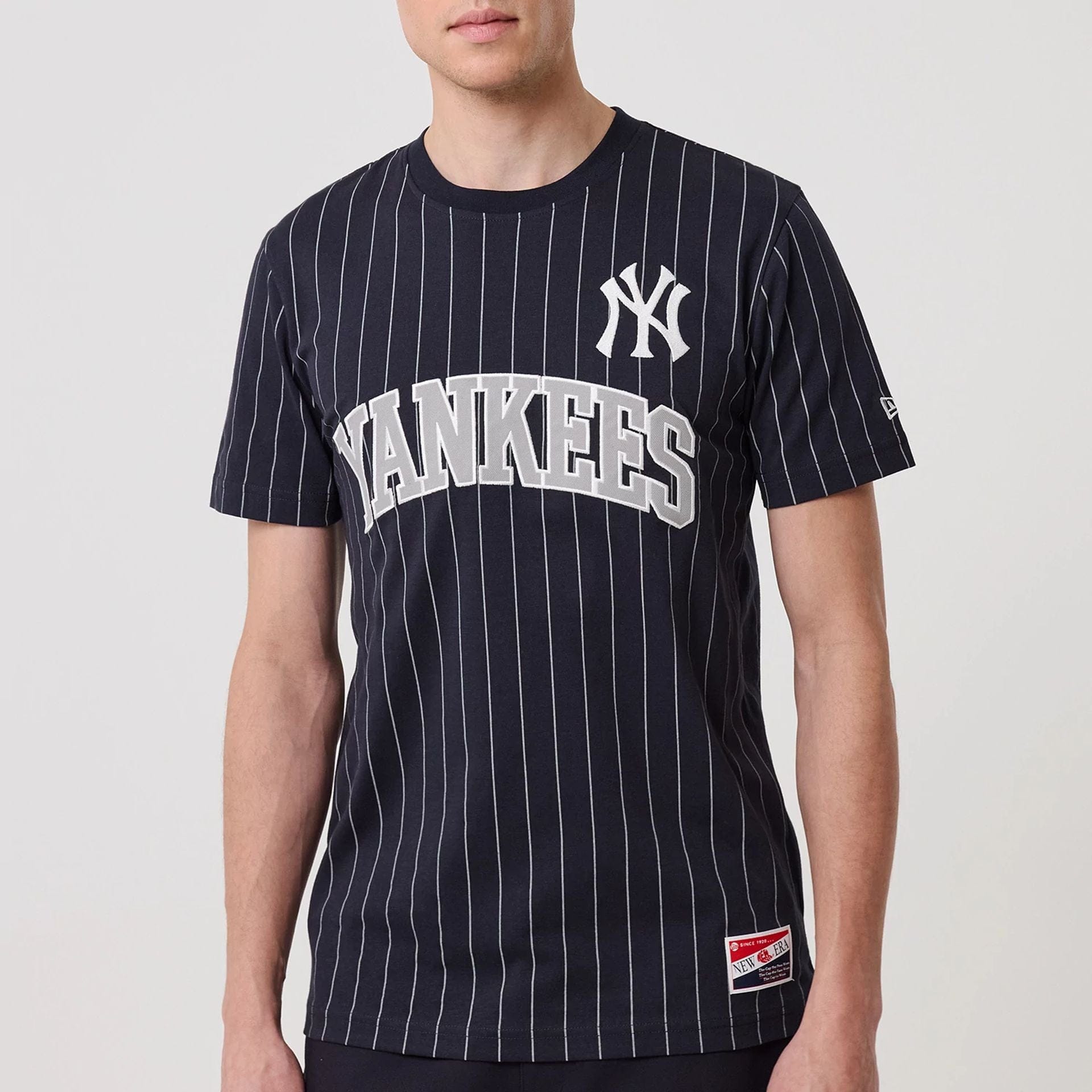 The model is wearing this MLB Pinstripe New York Yankees T-Shirt in navy. 5