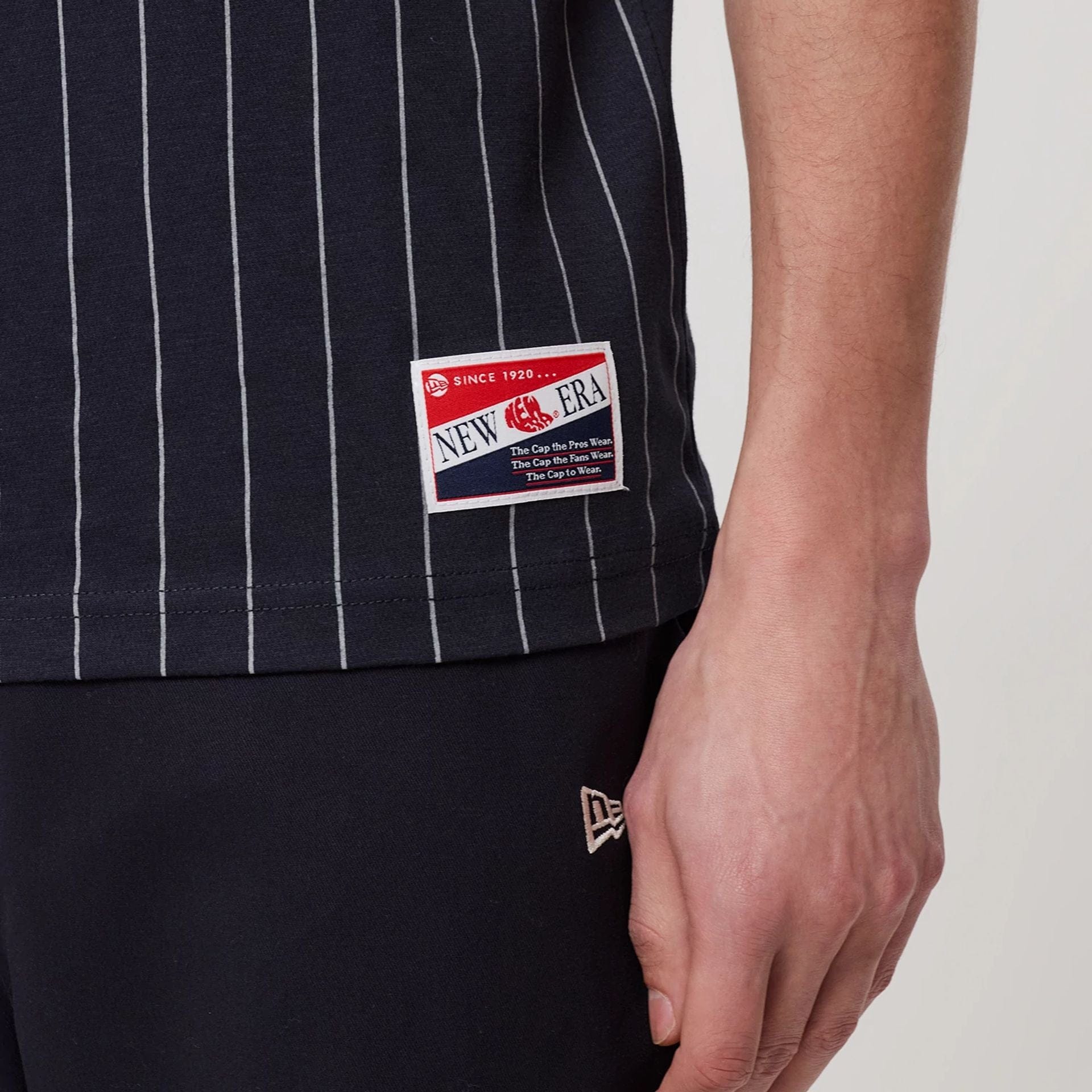 The model is wearing this MLB Pinstripe New York Yankees T-Shirt in navy. 4