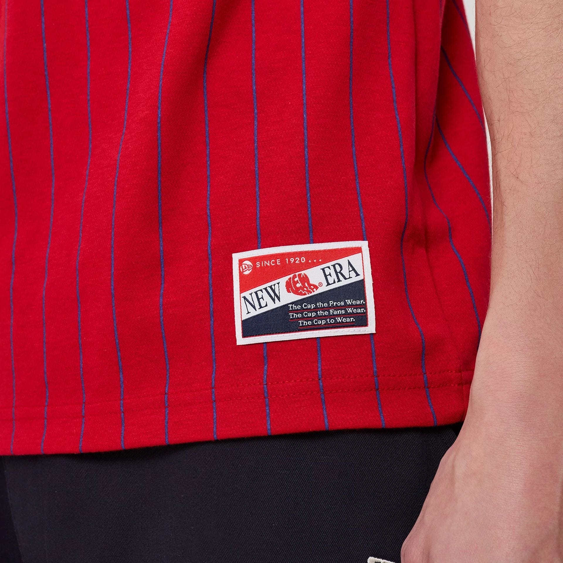 The model is wearing this MLB Pinstripe Philadelphia Phillies T-Shirt in red. 6