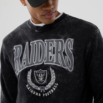 The model is wearing this NFL Las Vegas Raiders Laurel Wreath Crew Neck Sweater in black. 6