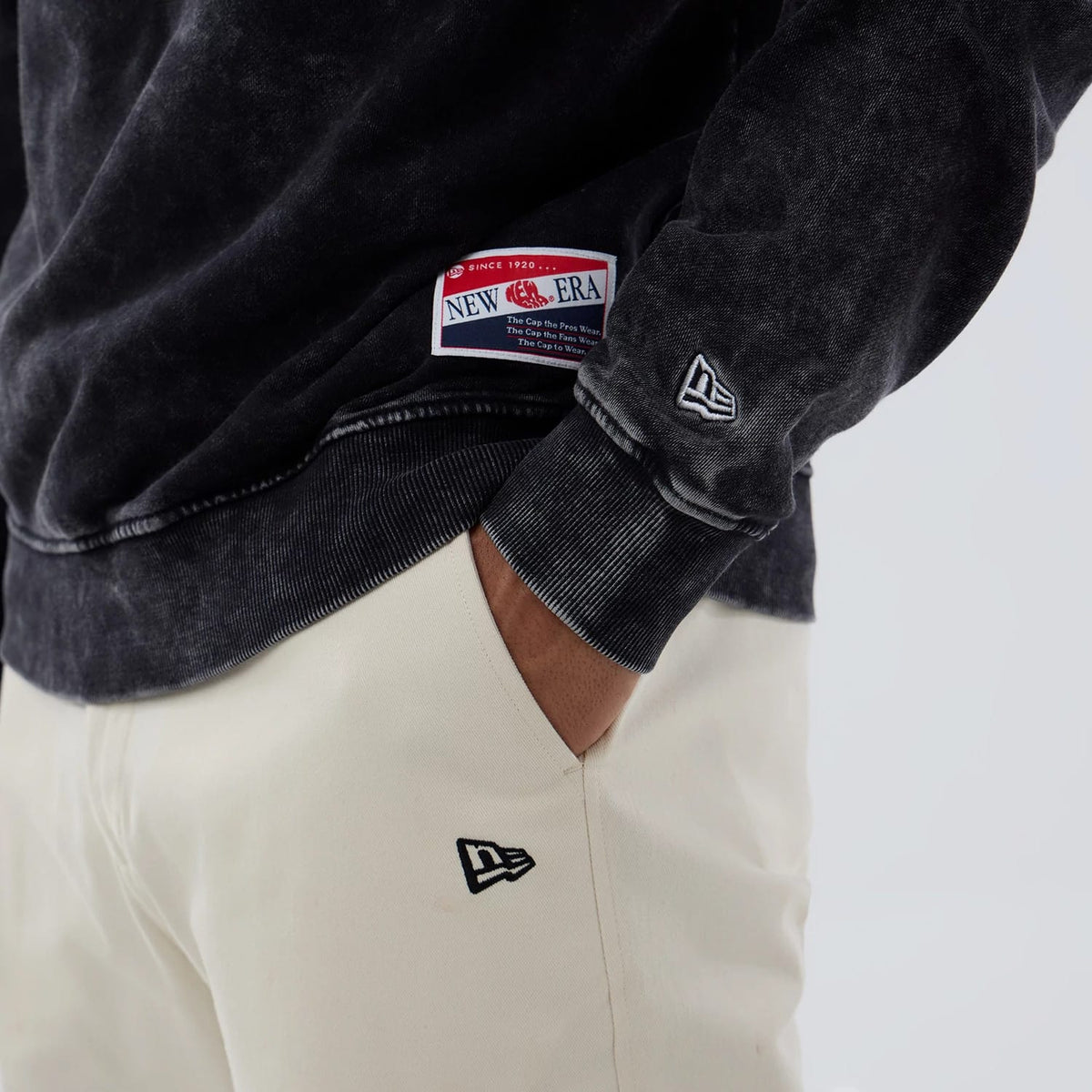 The model is wearing this NFL Las Vegas Raiders Laurel Wreath Crew Neck Sweater in black. 5
