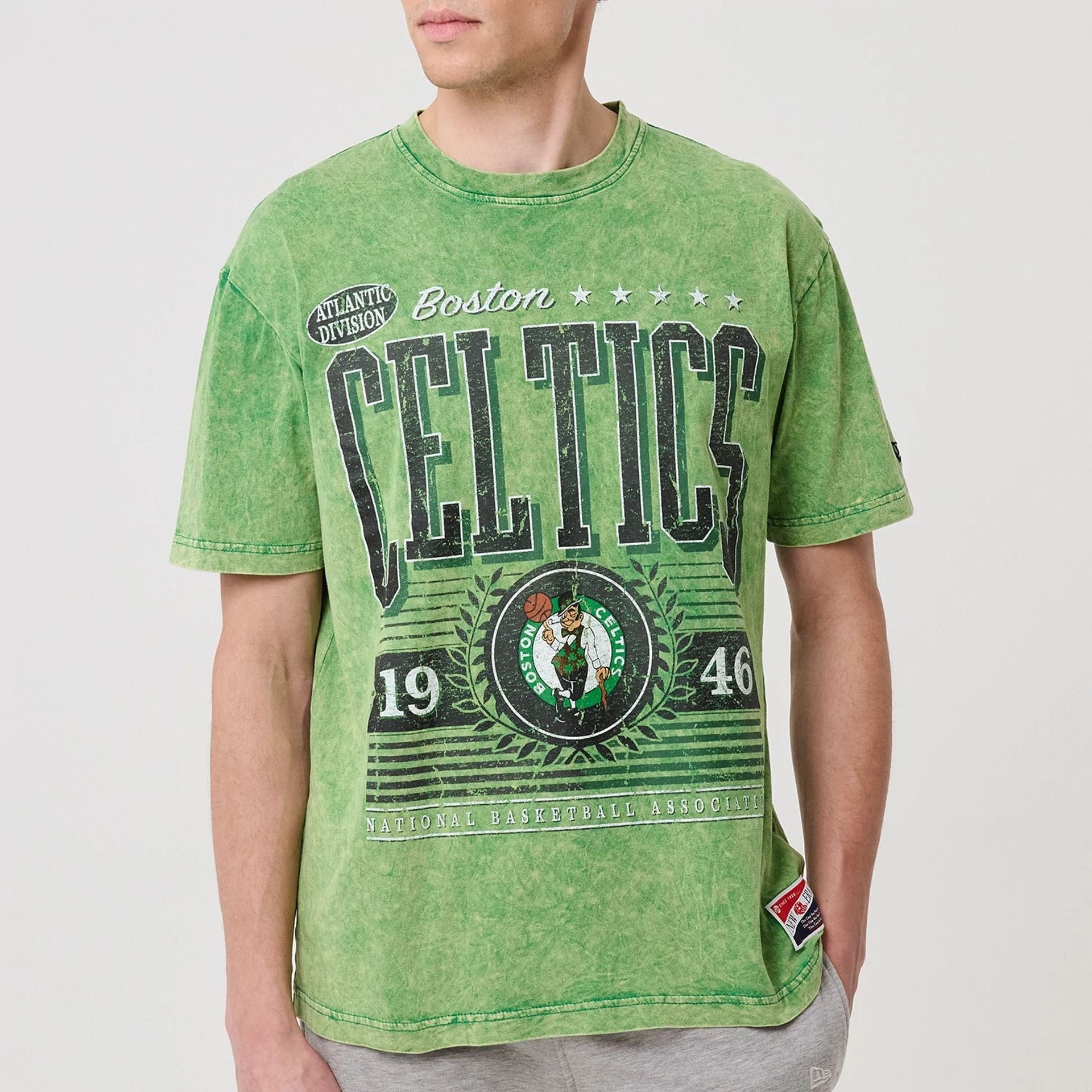 The model is wearing this NBA Boston Celtics T-Shirt in green. 5