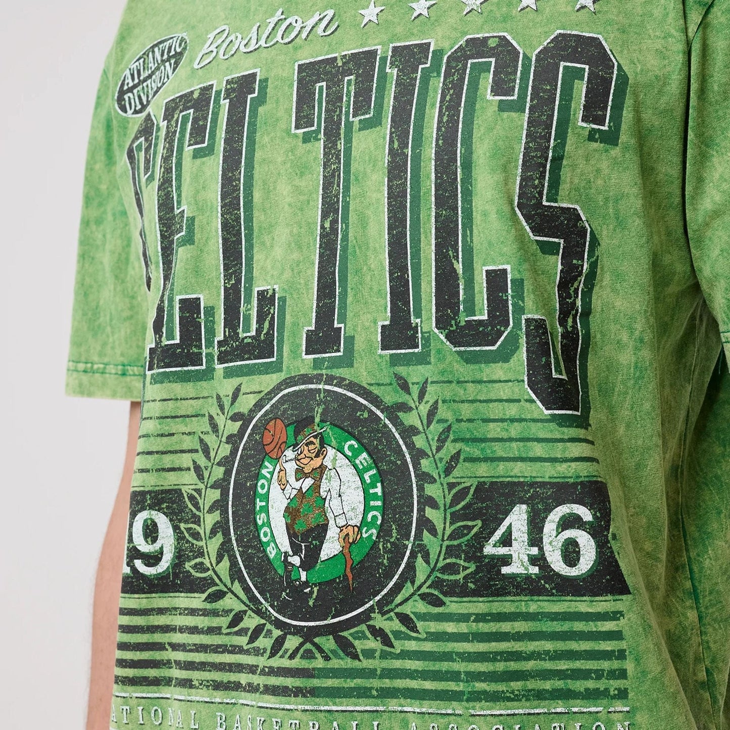 The model is wearing this NBA Boston Celtics T-Shirt in green. 3