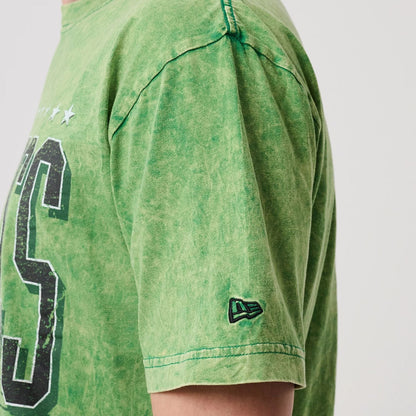 The model is wearing this NBA Boston Celtics T-Shirt in green. 6