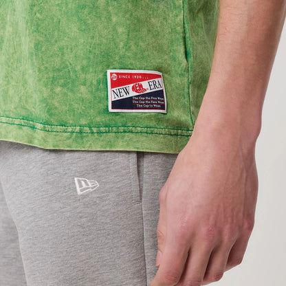 The model is wearing this NBA Boston Celtics T-Shirt in green. 4