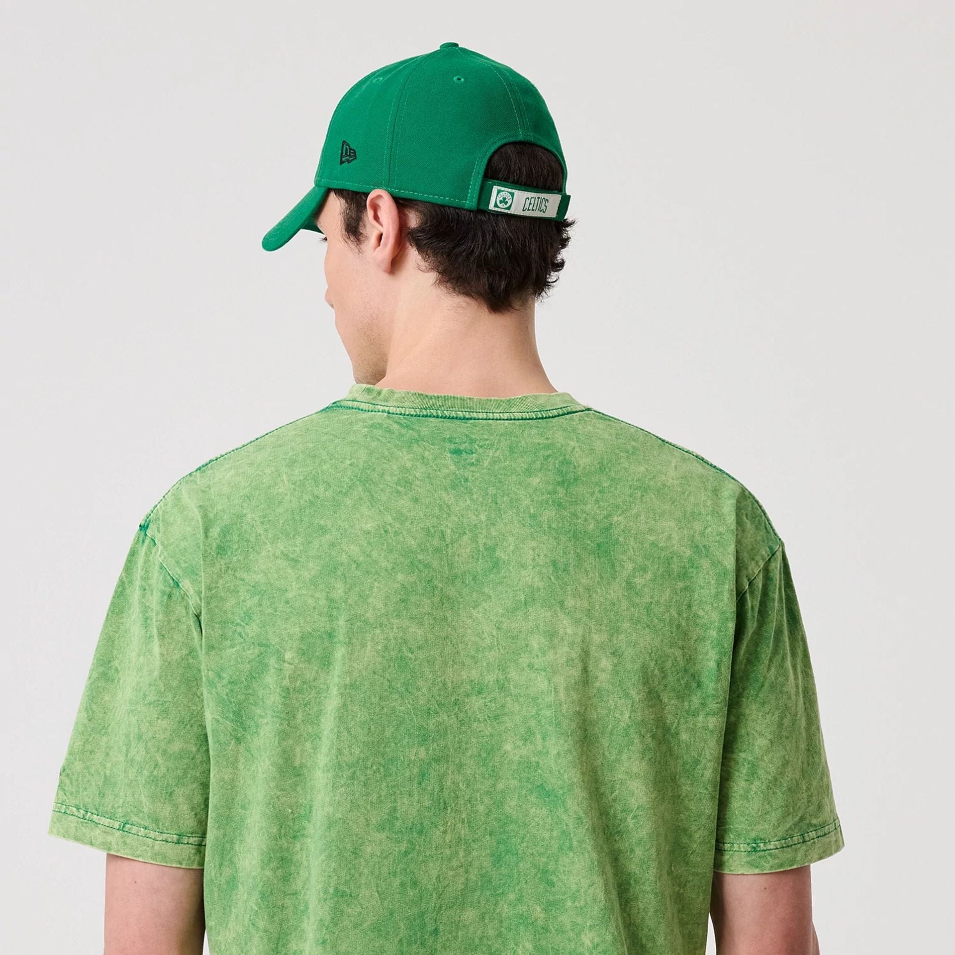 The model is wearing this NBA Boston Celtics T-Shirt in green. 7