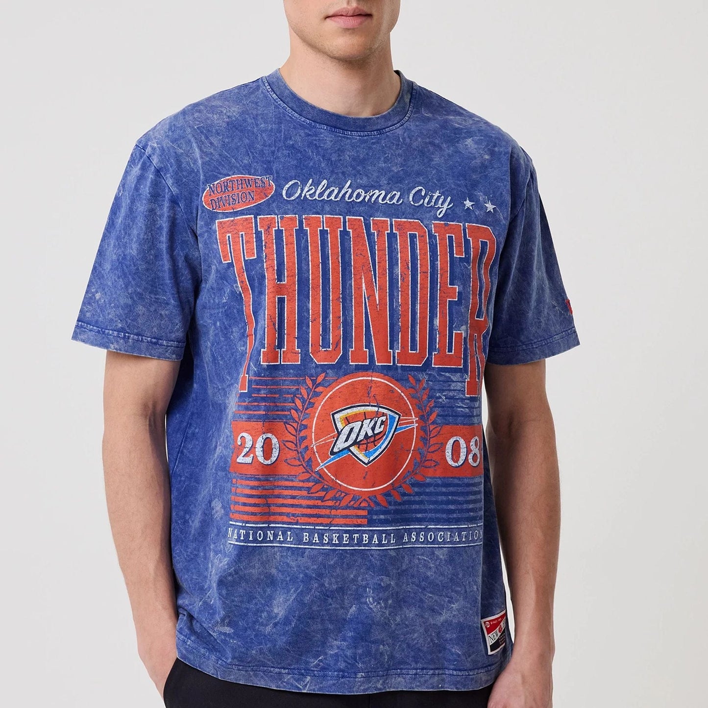 The model is wearing this NBA Oklahoma City Thunder T-Shirt in blue. 5