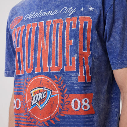 The model is wearing this NBA Oklahoma City Thunder T-Shirt in blue. 3