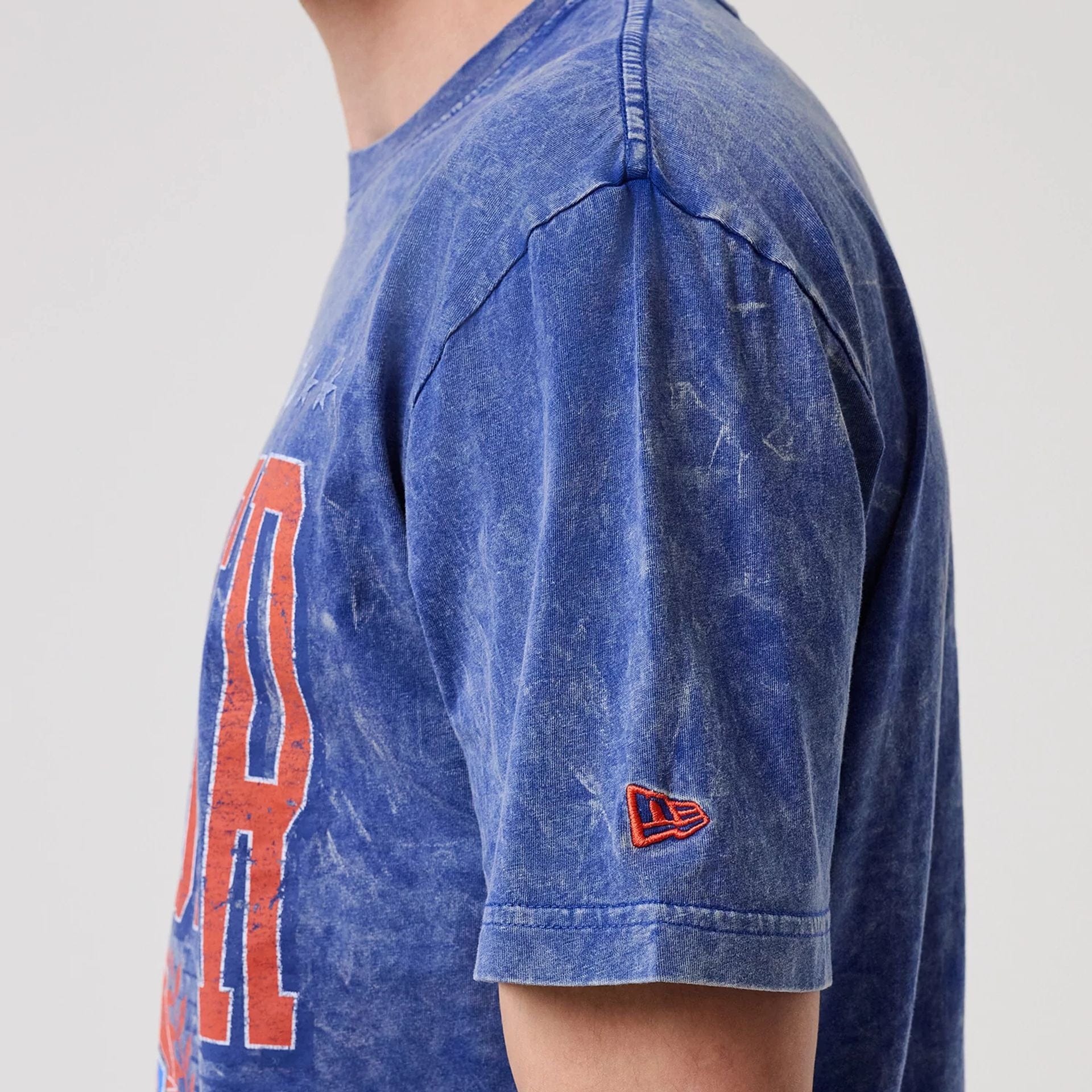 The model is wearing this NBA Oklahoma City Thunder T-Shirt in blue. 6