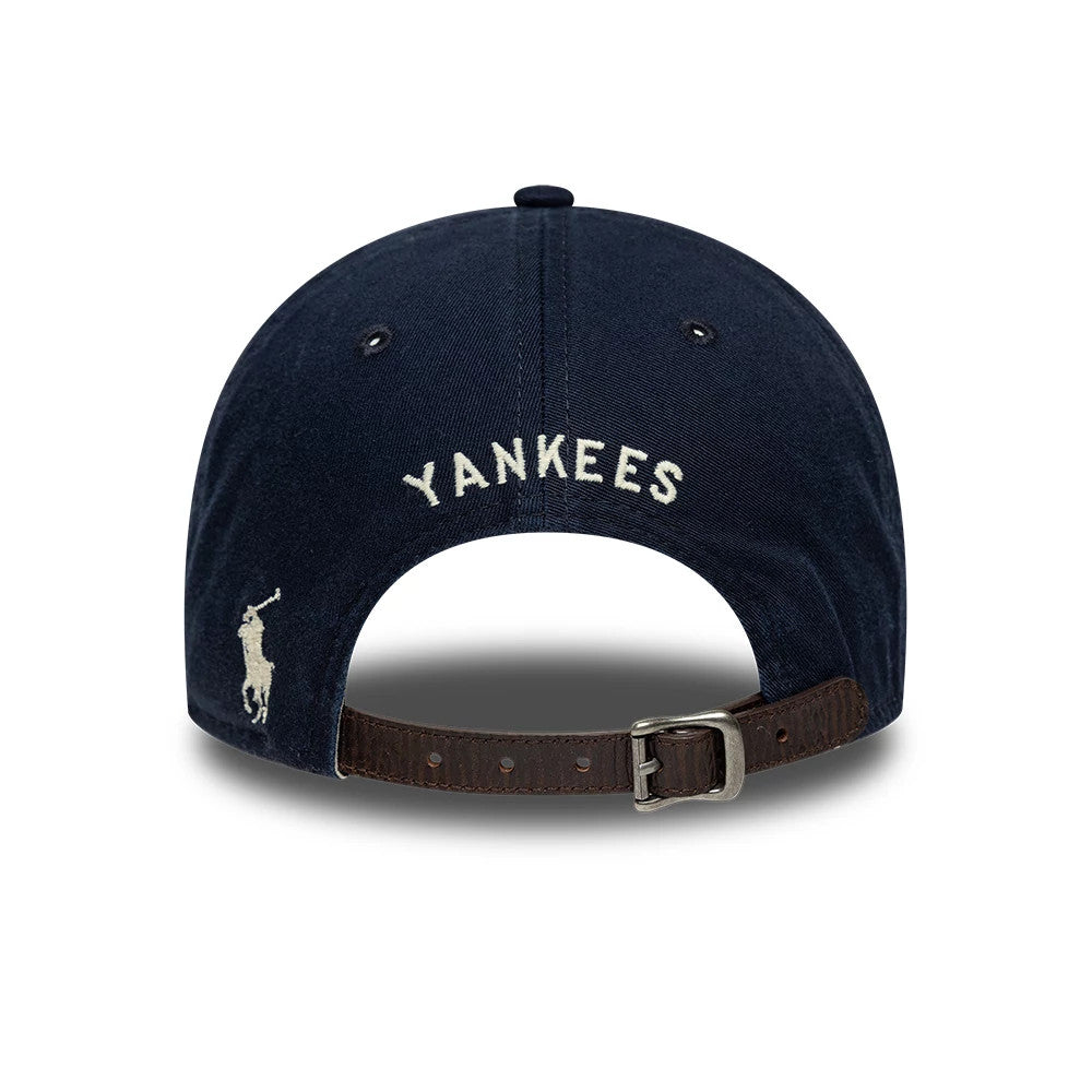 New York Yankees Ralph Lauren x MLB Navy Long Visor New Era 9FORTY Adjustable Cap, rear view showing the white Yankees text embroidered on the back panel and the Polo Pony logo on the left side above the adjustable brown leather strap.