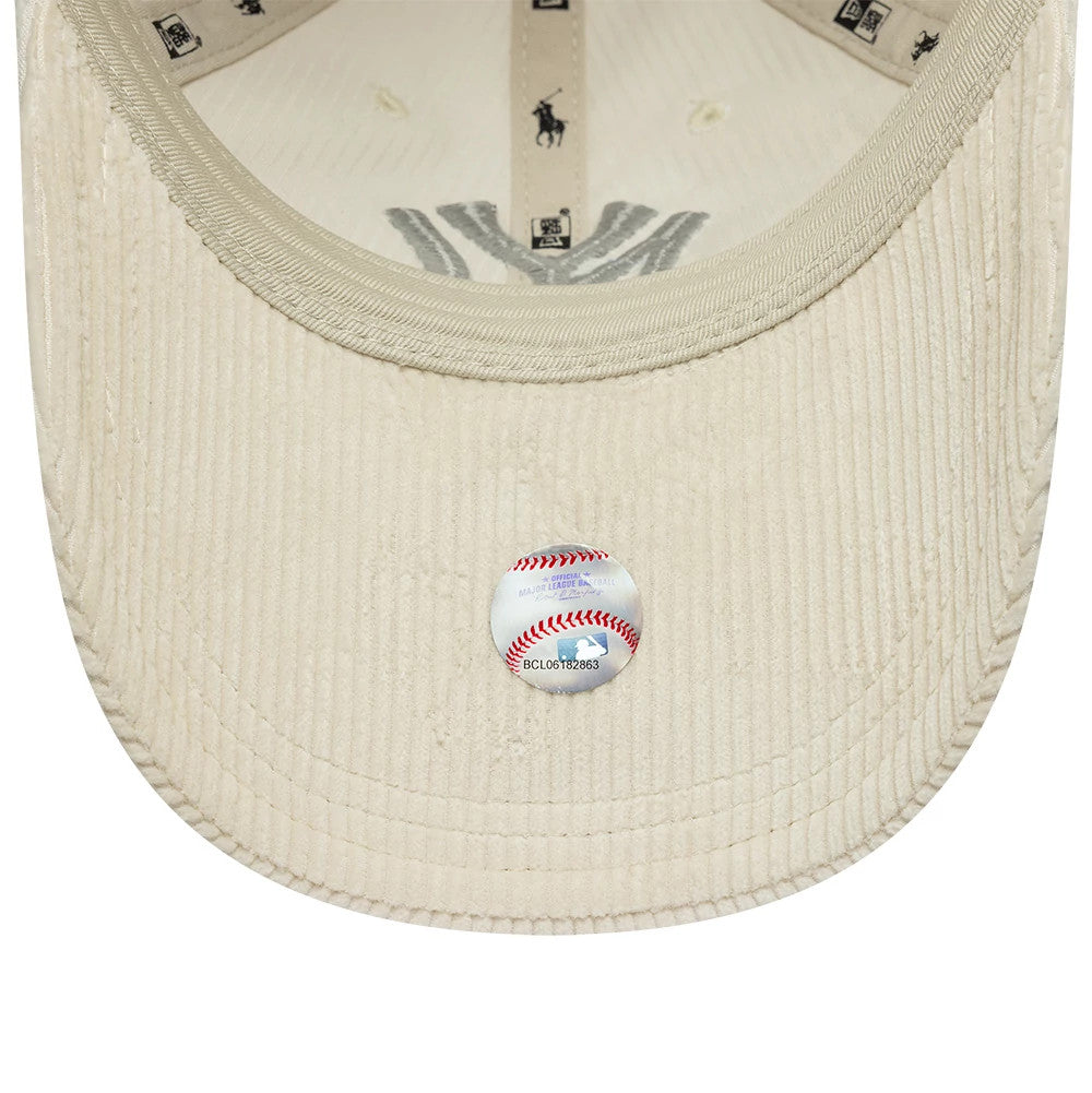 New York Yankees Ralph Lauren x MLB Cord Open Beige Long Visor New Era 9FORTY Adjustable Cap, inside view showing tan taping with New Era and Ralph Lauren Polo logos, cream sweatband, and a baseball-themed sticker on the ribbed cord visor.
