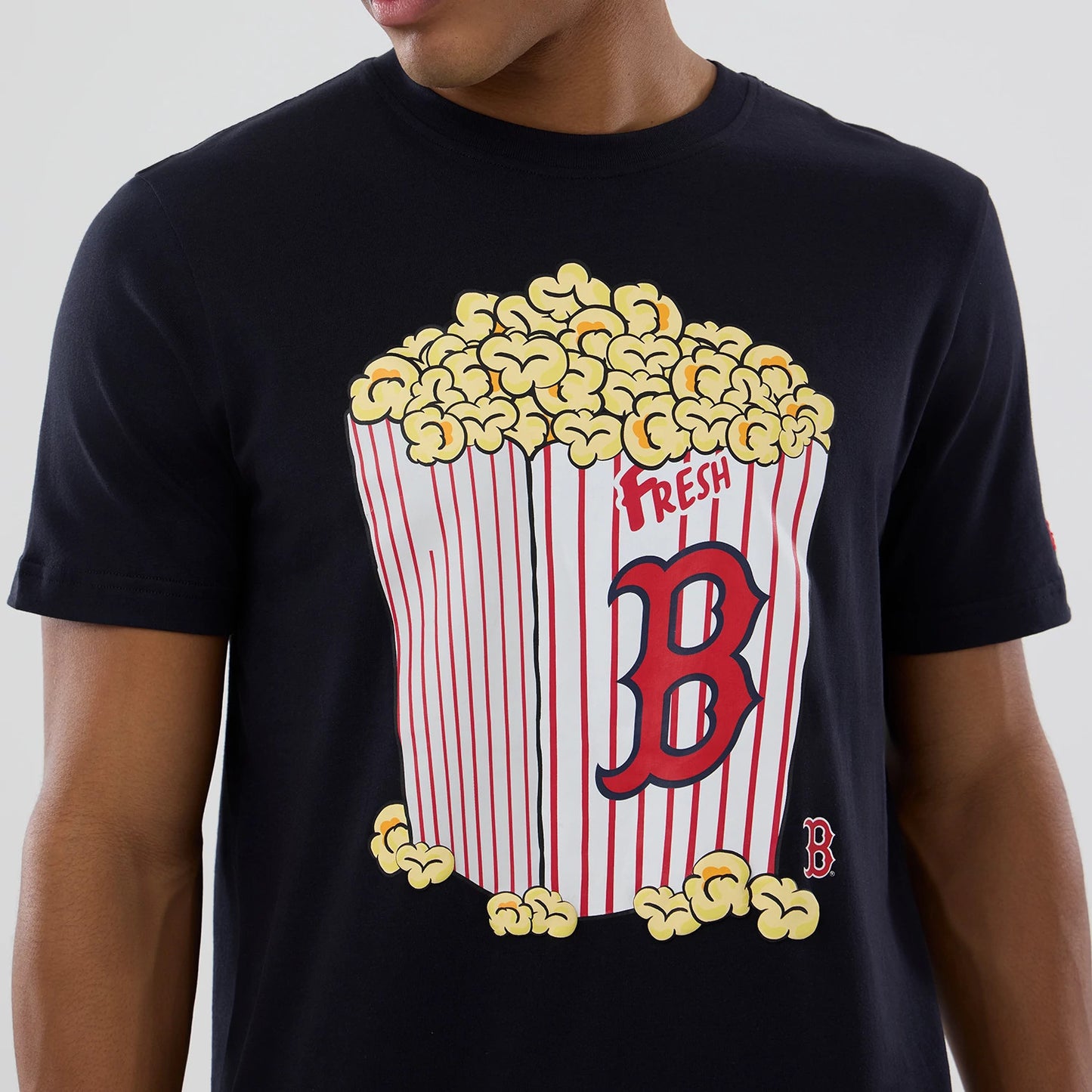 The model is wearing this MLB Popcorn Boston Red Sox T-Shirt in navy. 4