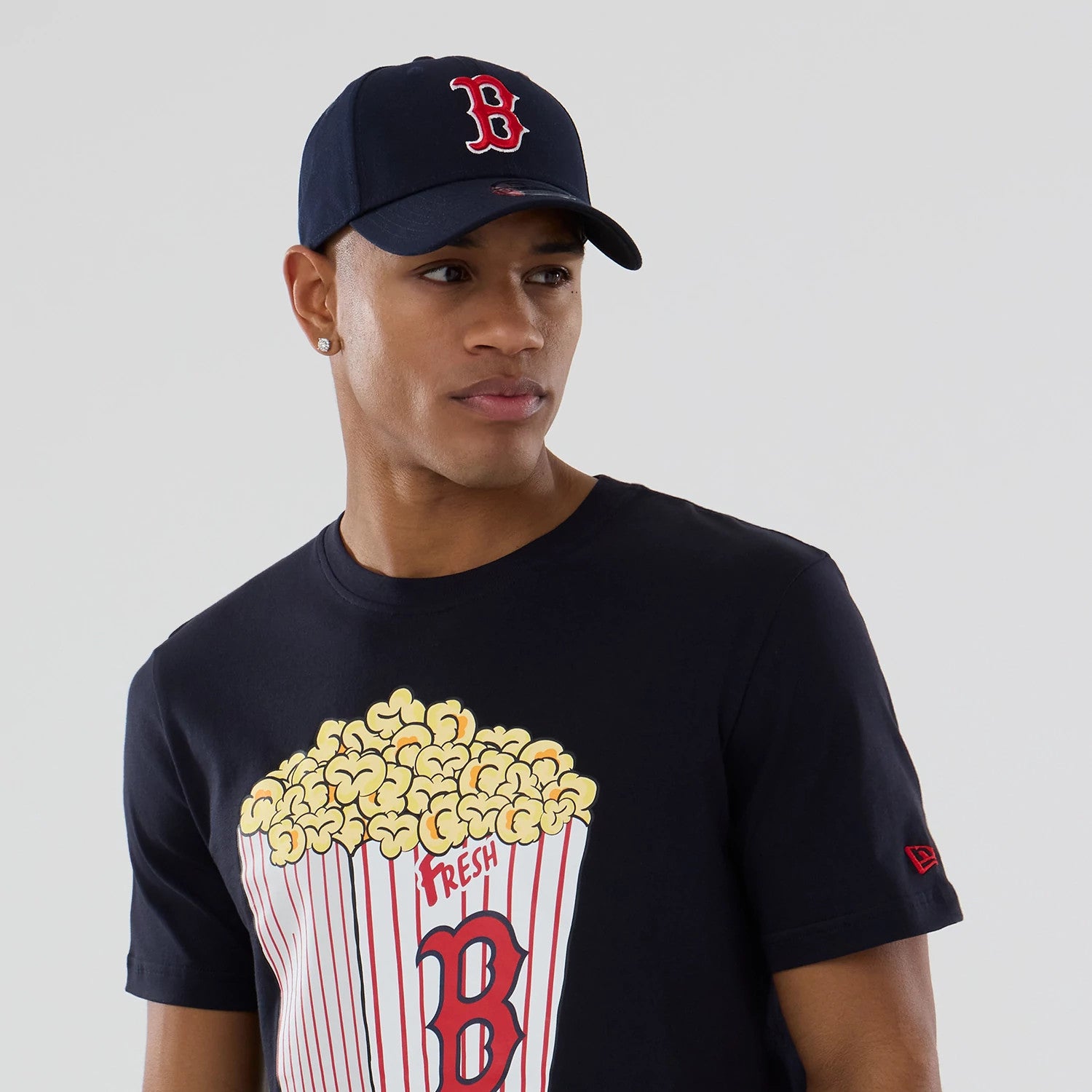 The model is wearing this MLB Popcorn Boston Red Sox T-Shirt in navy. 6