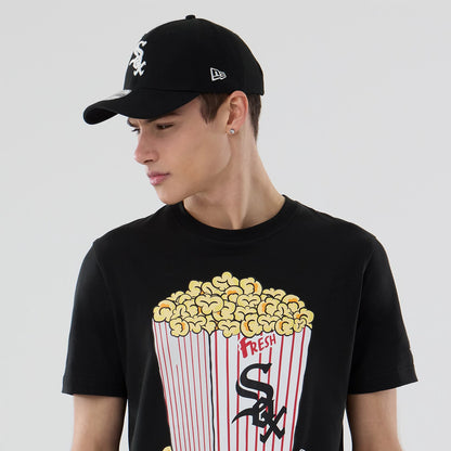 The model is wearing this MLB Popcorn Chicago White Sox T-Shirt in black. 7