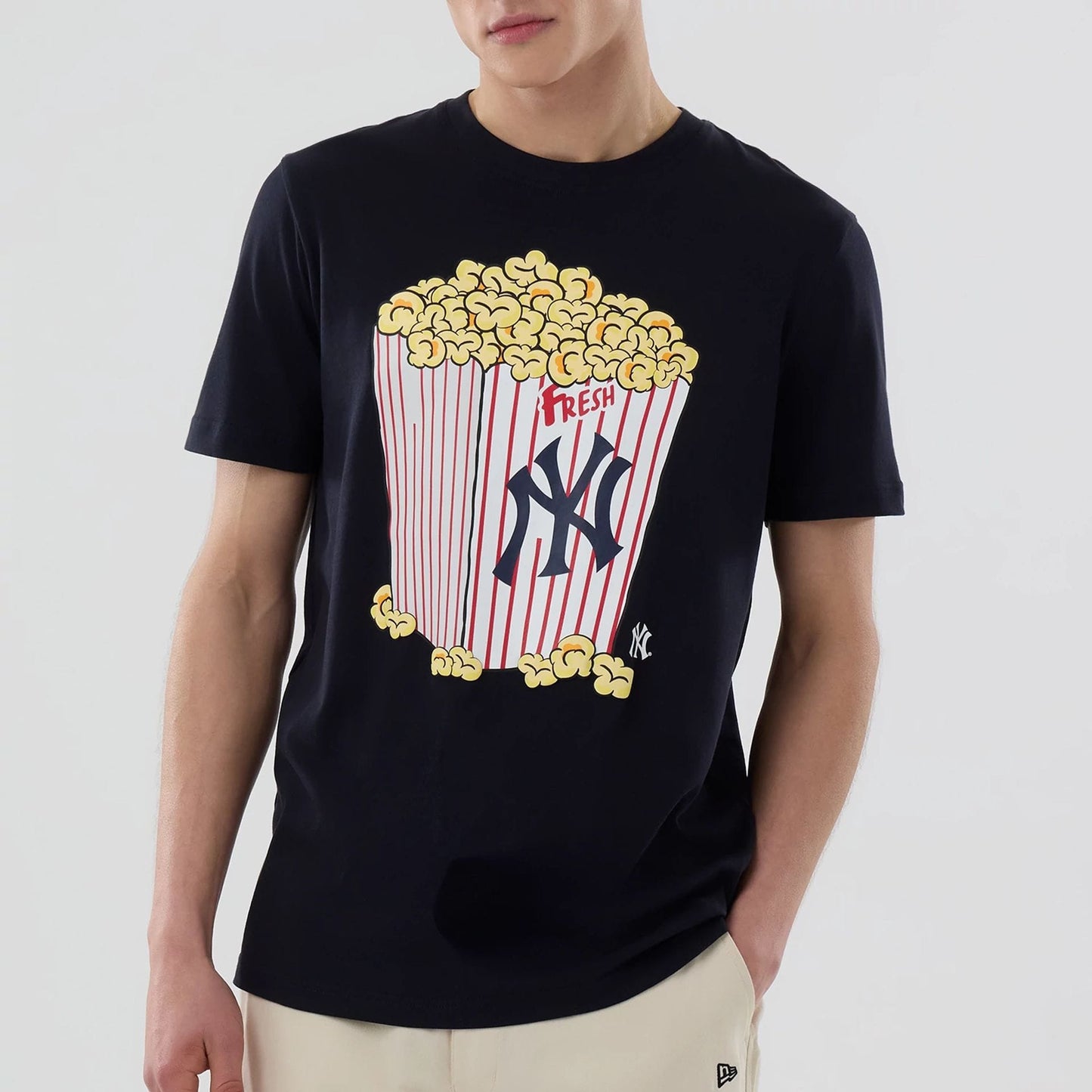 The model is wearing this MLB Popcorn New York Yankees T-Shirt in navy. 3