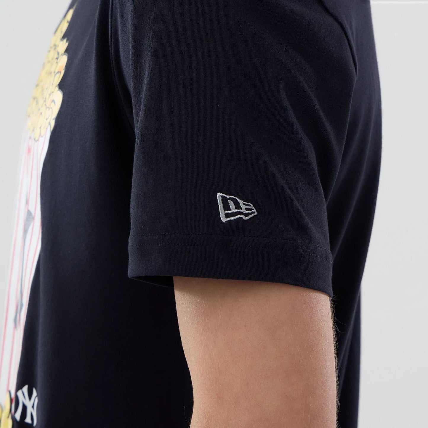 The model is wearing this MLB Popcorn New York Yankees T-Shirt in navy. 4