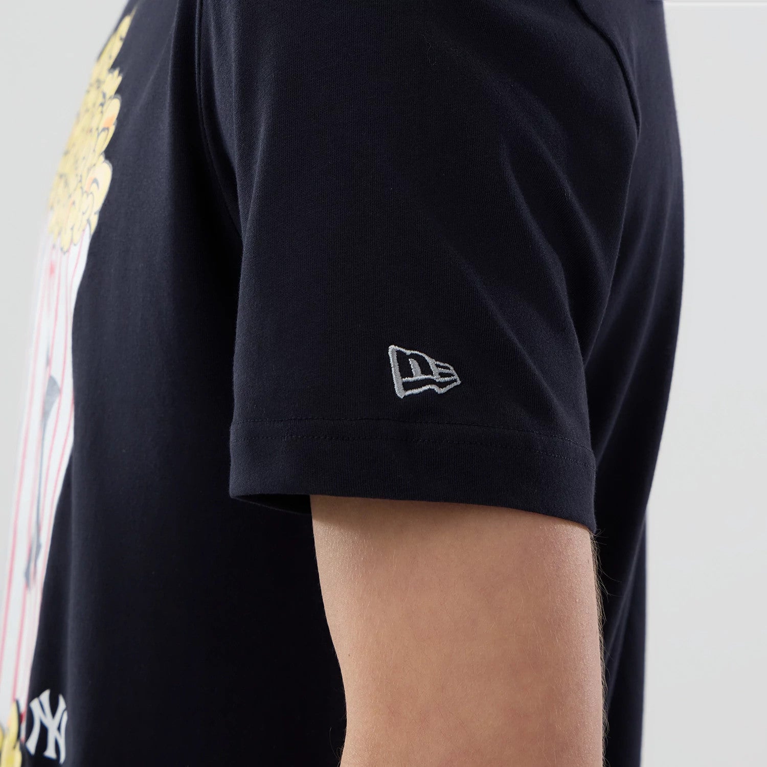 The model is wearing this MLB Popcorn New York Yankees T-Shirt in navy. 4