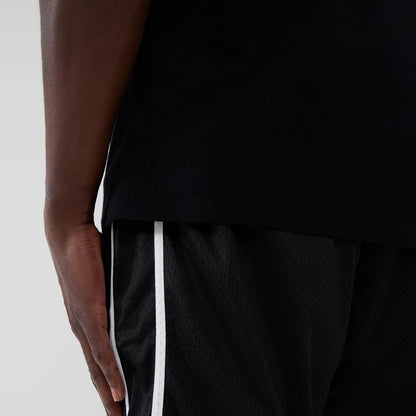 The model is wearing these NBA Chicago Bulls Mesh Shorts in black. 5