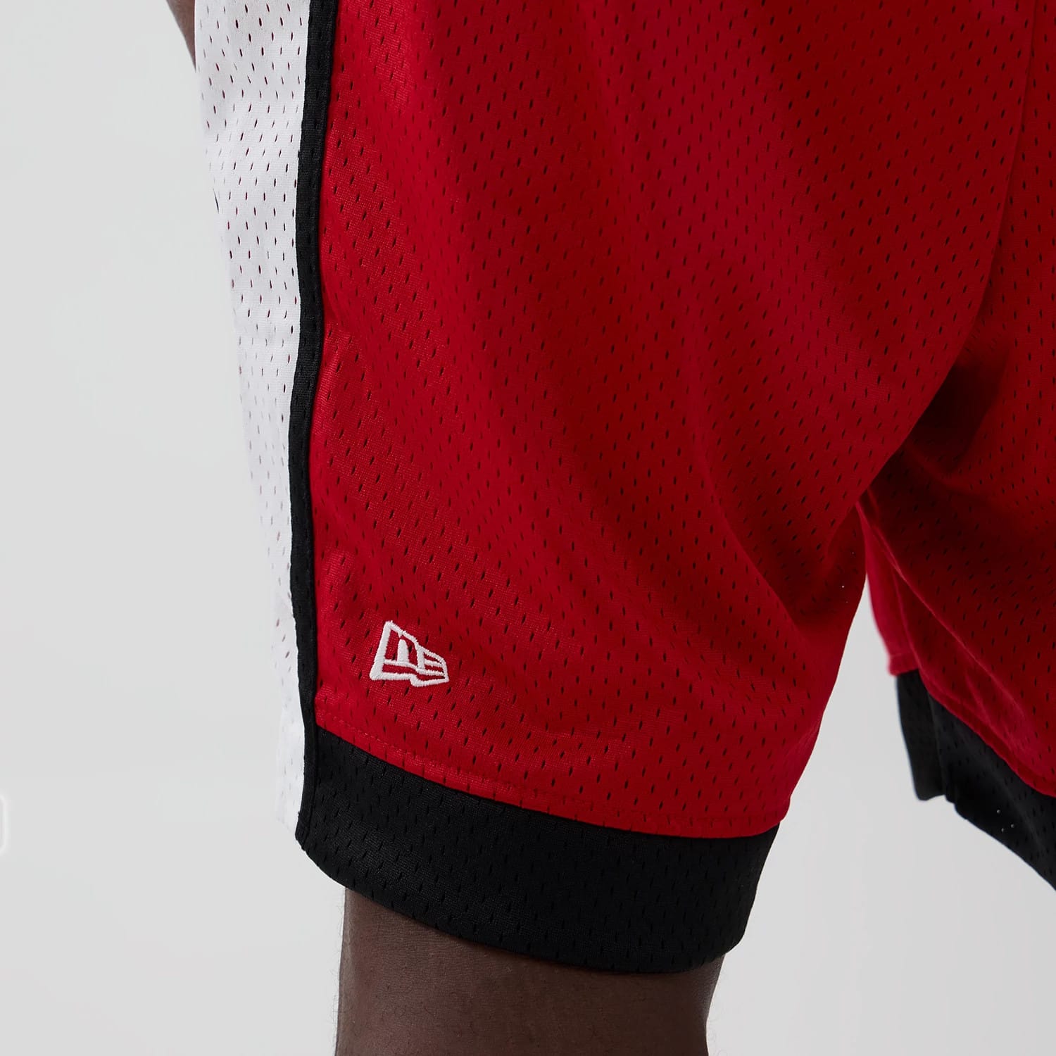 The model is wearing these NFL Kansas City Chiefs Mesh Shorts in red. 4