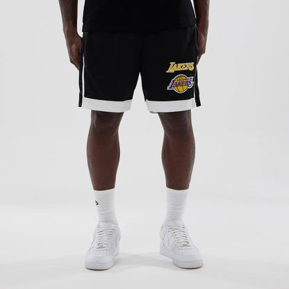 The model is wearing these NBA LA Lakers Mesh Shorts in black. 1