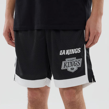 The model is wearing these NHL LA Kings Mesh Shorts in black. 5