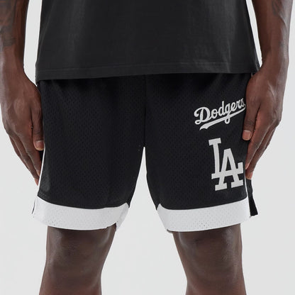 The model is wearing these MLB LA Dodgers Mesh Shorts in black. 2