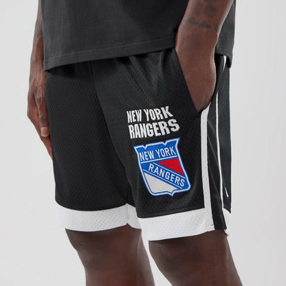 The model is wearing these NHL New York Rangers Mesh Shorts in black. 3