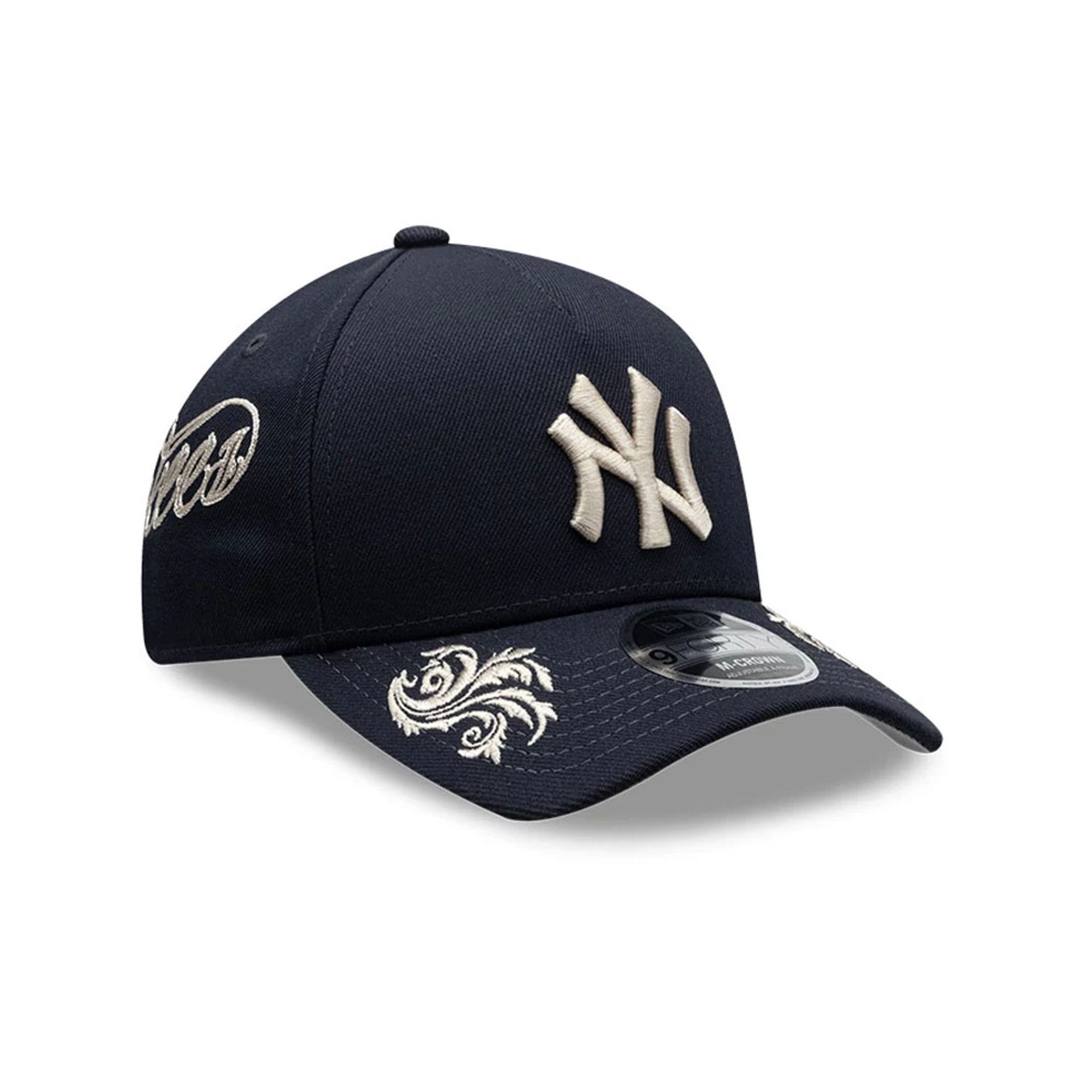 Pictured is this MLB Script New York Yankees 9FORTY M-Crown A-Frame Adjustable cap in navy. 1