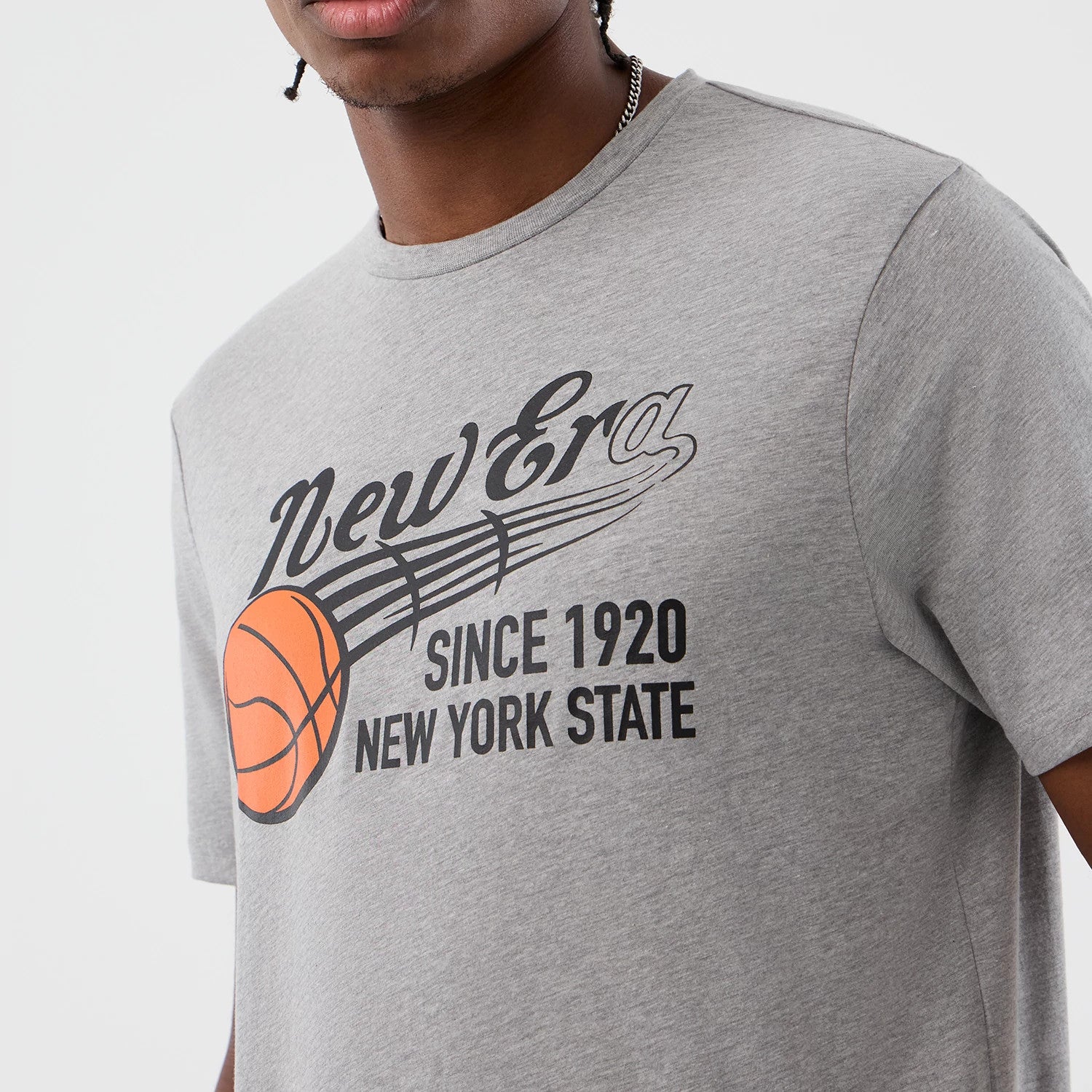 The Male model is wearing  New Era Back To School Grey T-Shirt 4