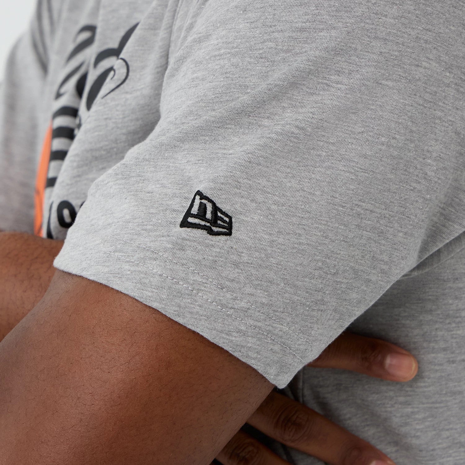 The Male model is wearing  New Era Back To School Grey T-Shirt 5