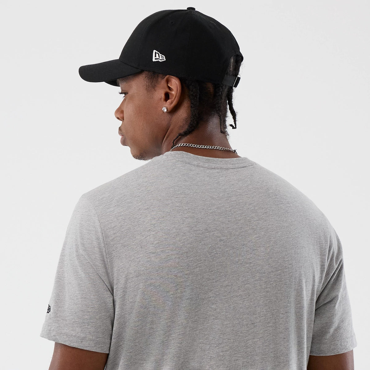 The Male model is wearing  New Era Back To School Grey T-Shirt 7