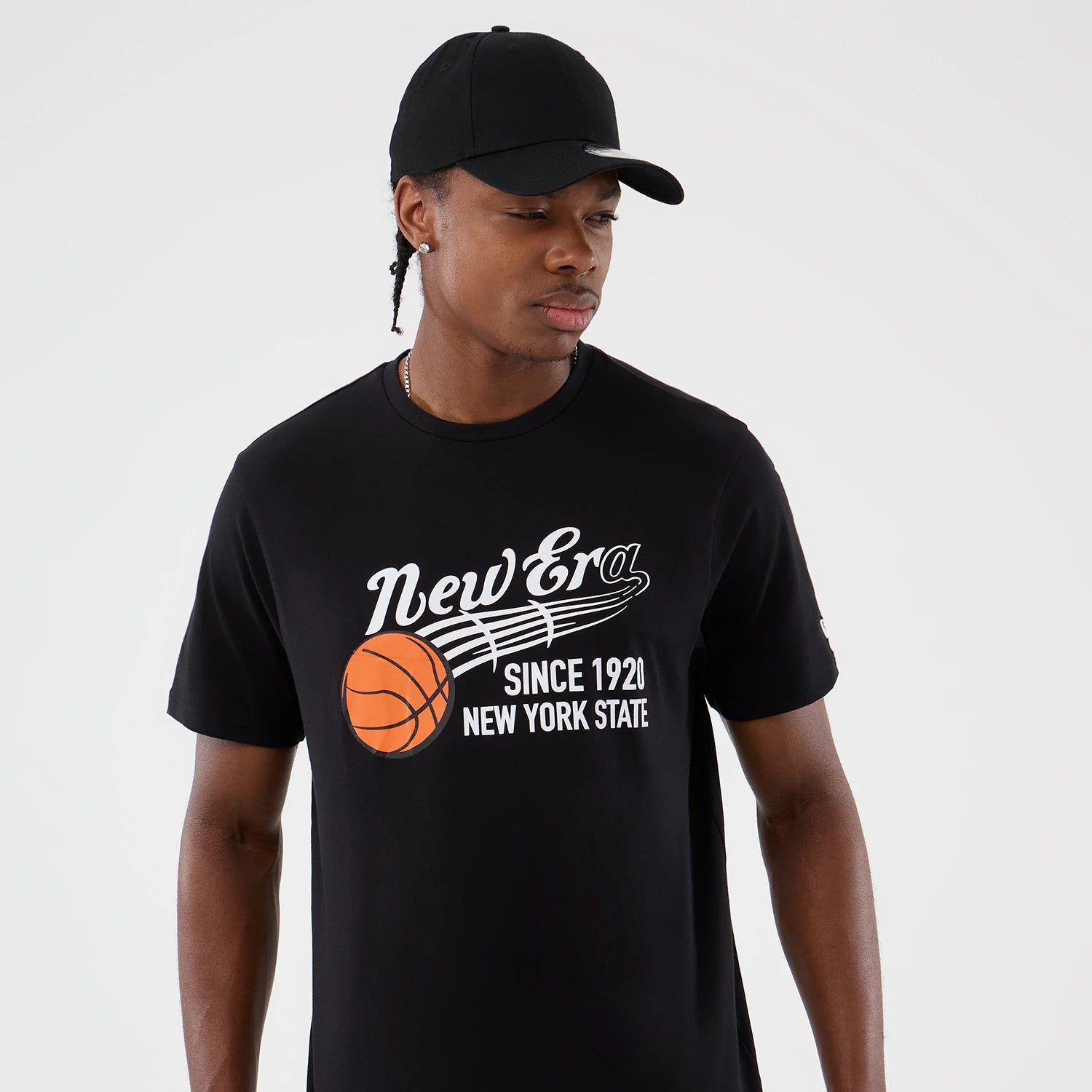 The Male model is wearing  New Era Back To School Black T-Shirt 3