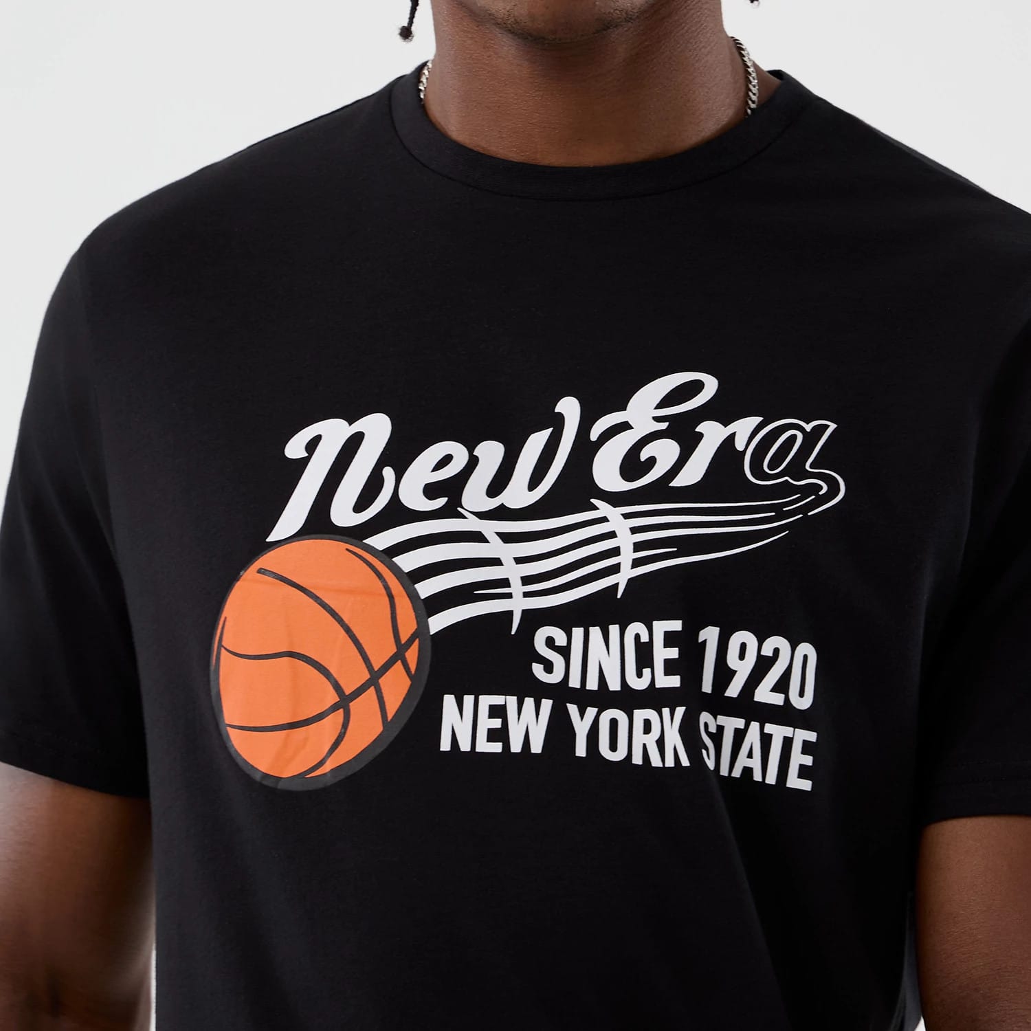 The Male model is wearing  New Era Back To School Black T-Shirt 4