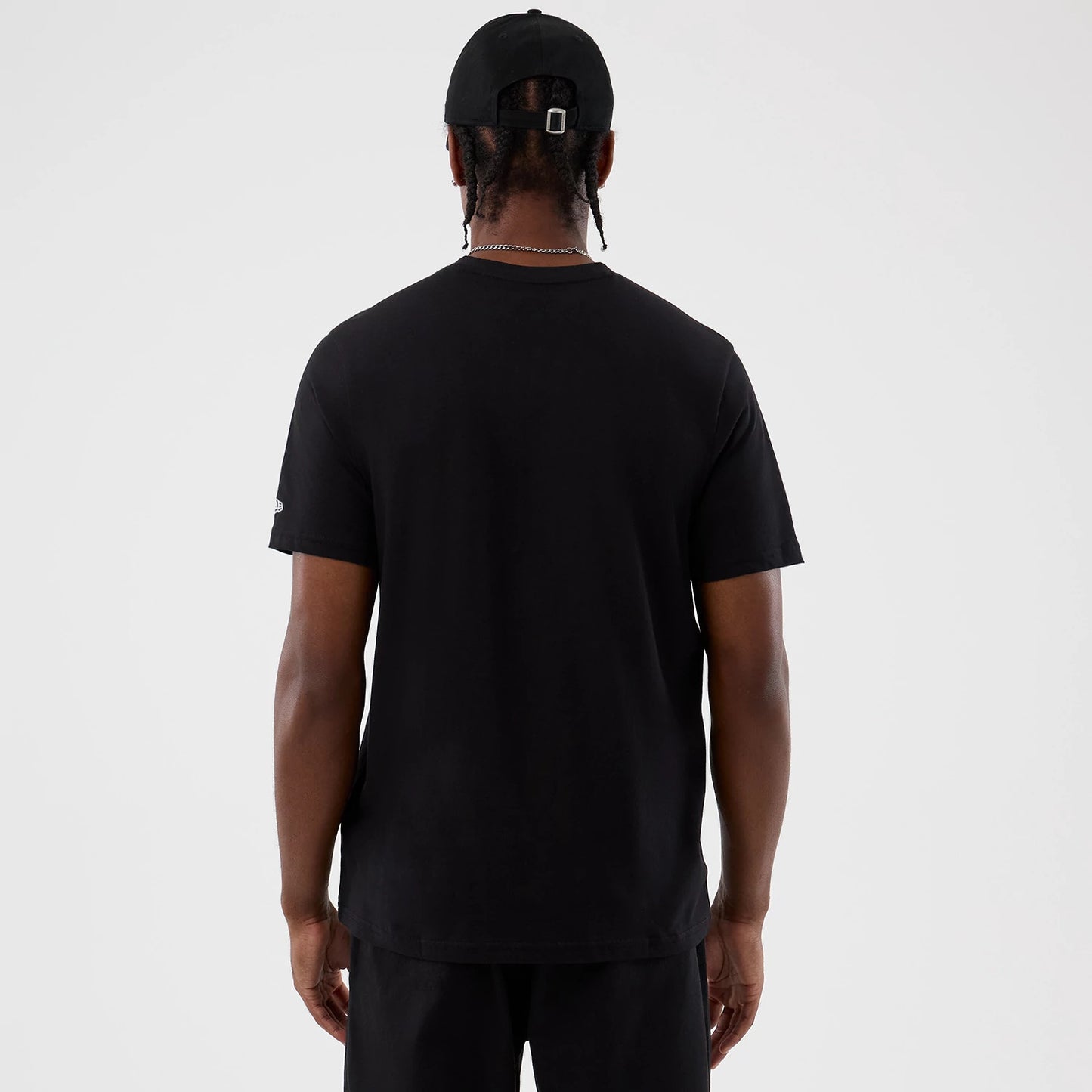 The Male model is wearing  New Era Back To School Black T-Shirt 2