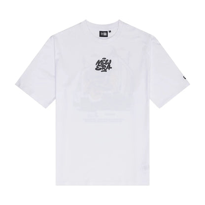 The Male model is wearing New Era Graffiti Graphic White Oversized T-Shirt 1