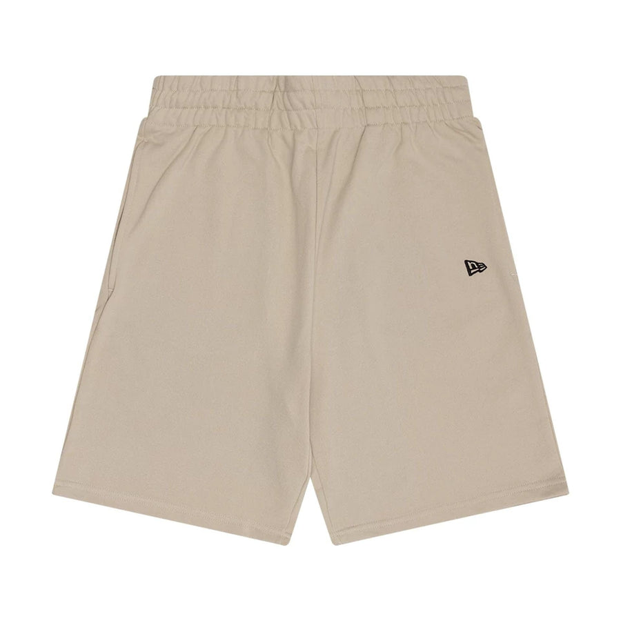 The Male model is wearing New Era Flag Light Beige Shorts 1