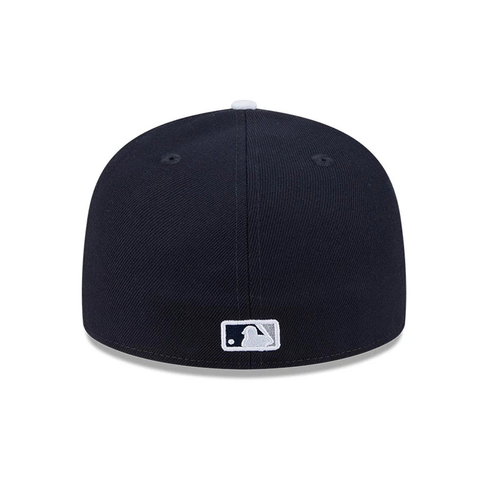 Yankees MLB Spring Training 2026 Navy Low Profile New Era 59FIFTY Fitted Cap, rear view showing the white embroidered MLB Batterman logo centred at the back of the navy crown, with matching eyelets and top button detail.