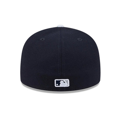 Yankees MLB Spring Training 2026 Navy Low Profile New Era 59FIFTY Fitted Cap, rear view showing the white embroidered MLB Batterman logo centred at the back of the navy crown, with matching eyelets and top button detail.