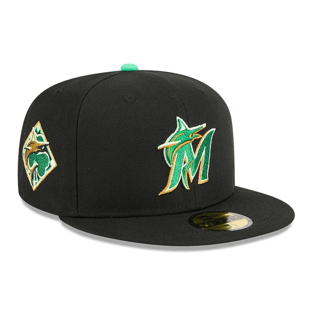 Pictured is this MLB Saint Patrick's Day Miami Marlins 59FIFTY Fitted cap in black. 1