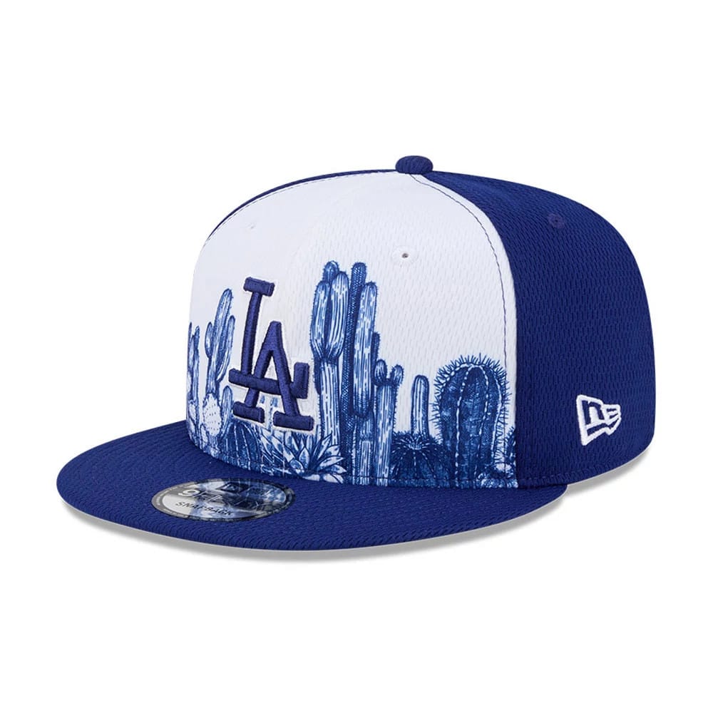 Pictured is this MLB Grow LA Dodgers 9FIFTY Snapback cap in dark blue. 1