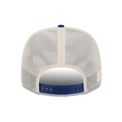 Pictured is this MLB Patch LA Dodgers 9SEVENTY Stretch Snap cap in dark blue. 7