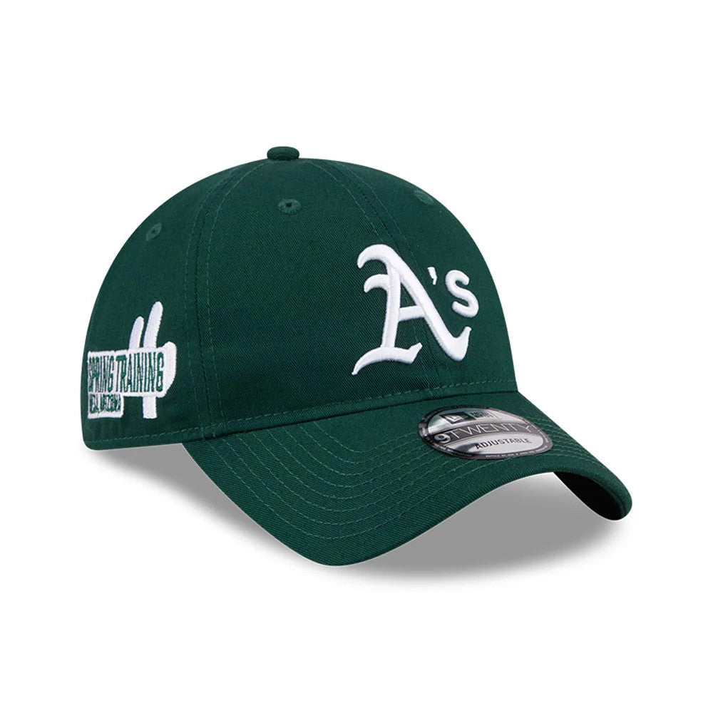 Athletics MLB Colours Dark Green New Era 9TWENTY Adjustable Cap, three-quarter view showing white raised embroidery of the A's logo on the front panel, with a flat black visor and a 9TWENTY size sticker.