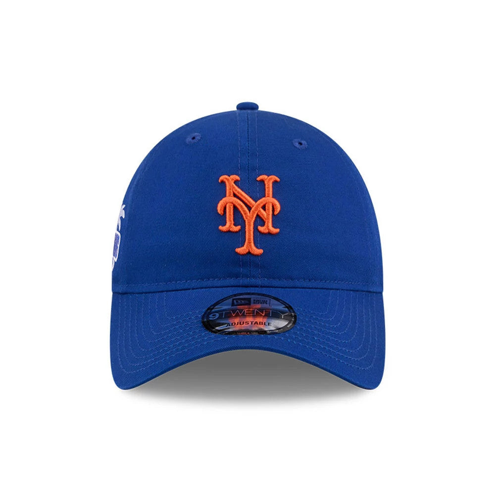 New York Mets MLB Colours Blue New Era 9TWENTY Adjustable Cap, front view showing the orange embroidered Mets logo on the centre front panel, with a curved blue visor and a 9TWENTY size sticker.