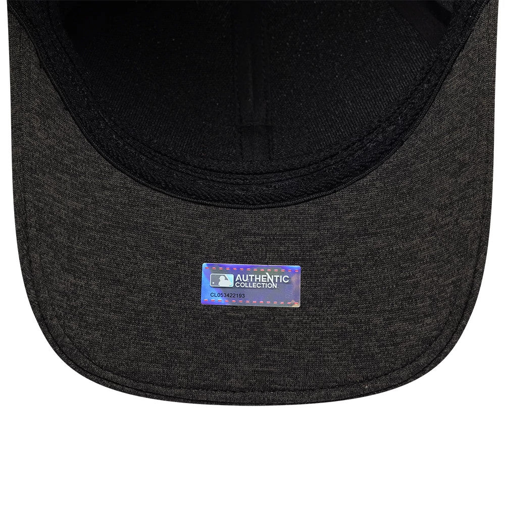 Baltimore Orioles MLB Clubhouse Black New Era 39THIRTY Infinity Stretch Fit Cap, inside view showing a holographic MLB Authentic Collection sticker centred on the black undervisor and black sweatband surrounding the headband area.