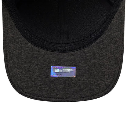 Baltimore Orioles MLB Clubhouse Black New Era 39THIRTY Infinity Stretch Fit Cap, inside view showing a holographic MLB Authentic Collection sticker centred on the black undervisor and black sweatband surrounding the headband area.