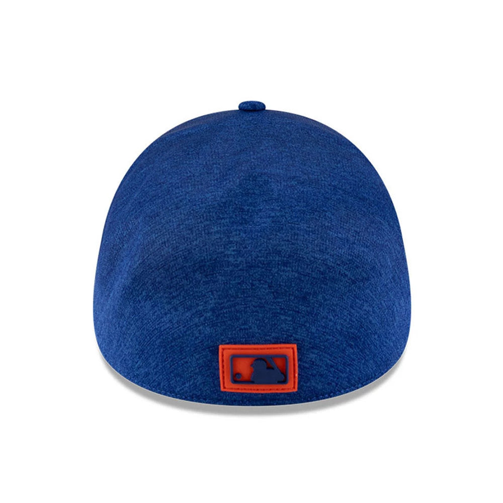 New York Mets MLB Clubhouse Blue New Era 39THIRTY Infinity Stretch Fit Cap, rear view showing the blue and orange MLB Batterman logo at the centre of the structured blue crown with a matching blue top button.