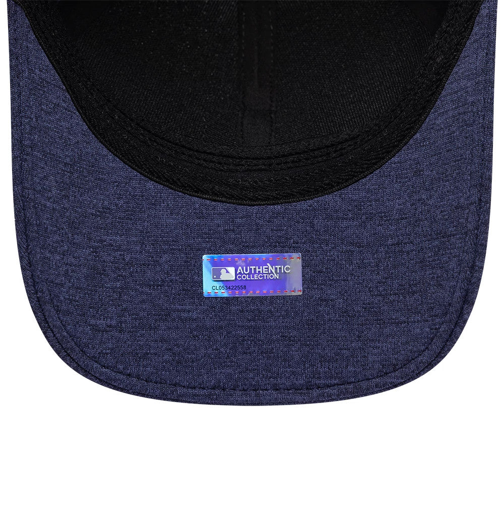 Tampa Bay Rays MLB Clubhouse Navy New Era 39THIRTY Infinity Stretch Fit Cap, inside view showing the black sweatband, dark undervisor and an Authentic Collection sticker centrally placed on the navy fabric.
