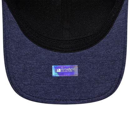 Tampa Bay Rays MLB Clubhouse Navy New Era 39THIRTY Infinity Stretch Fit Cap, inside view showing the black sweatband, dark undervisor and an Authentic Collection sticker centrally placed on the navy fabric.
