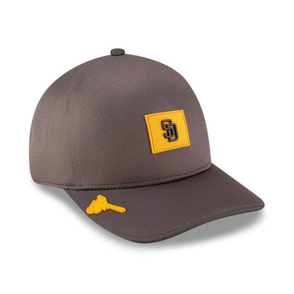 San Diego Padres MLB Clubhouse Dark Brown New Era 39THIRTY Infinity Stretch Fit Cap, three-quarter view showing a raised SD logo on a yellow front patch and a small yellow pin on the dark brown curved visor.